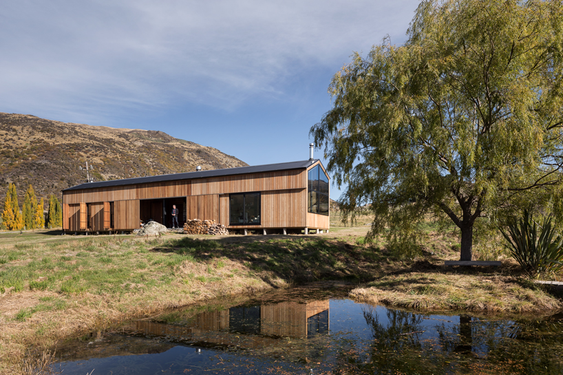 RTA studio nestles a timber-clad holiday home into new zealand's southern alps