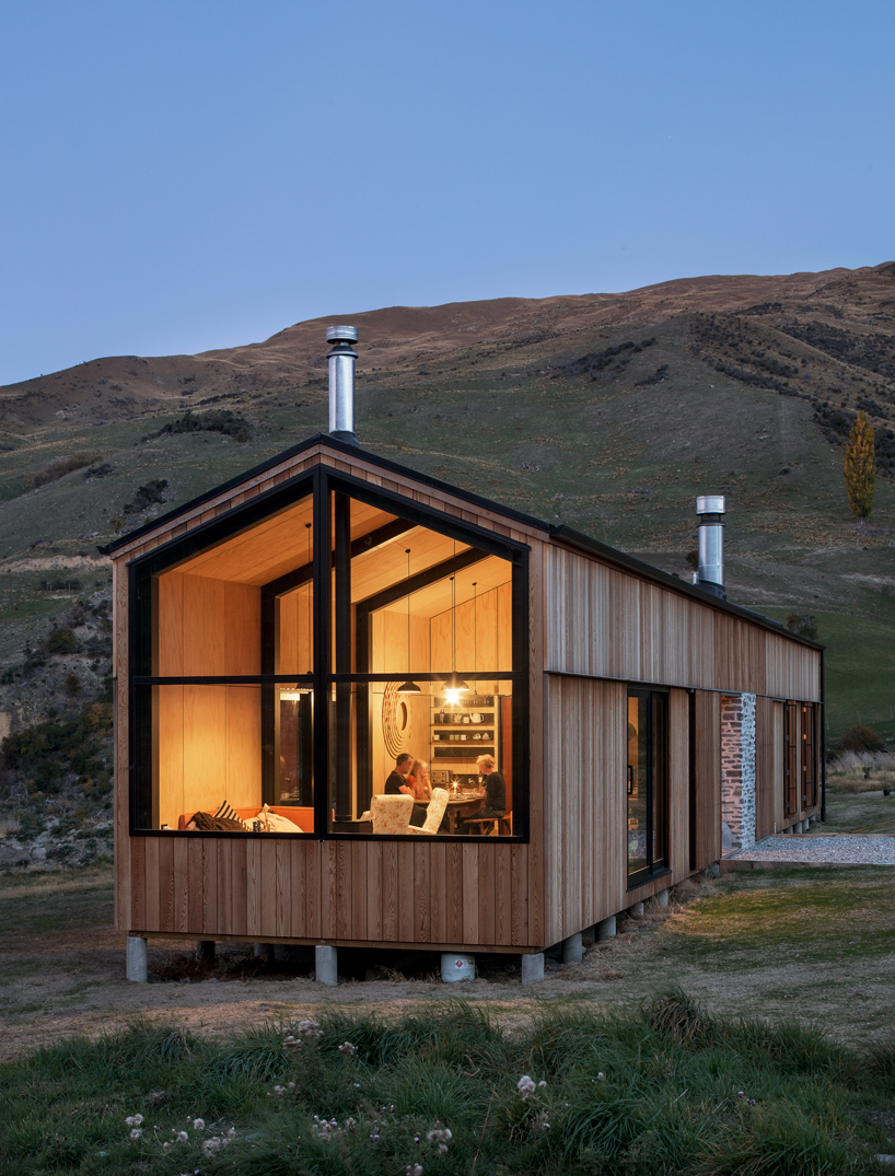 RTA studio nestles a timber-clad holiday home into new zealand's southern alps