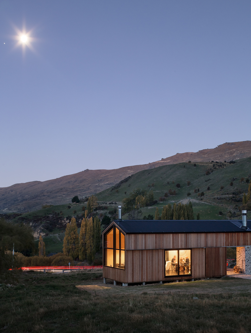 RTA studio nestles a timber-clad holiday home into new zealand's southern alps
