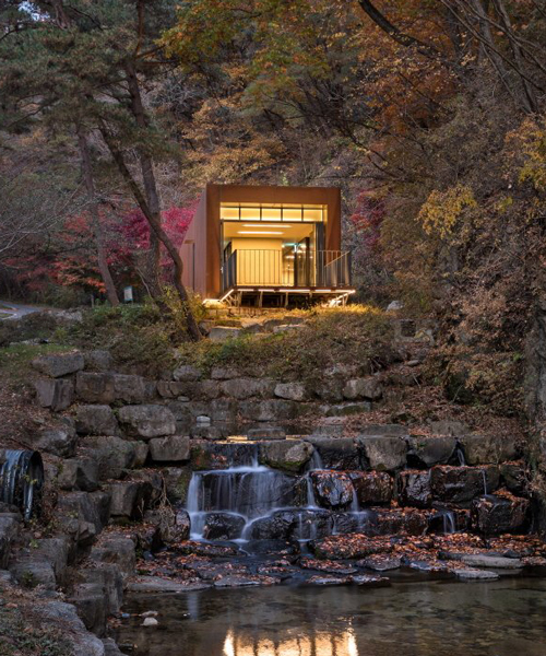 D.LIM architects blends a burnt orange tourist center into a korean mountainside