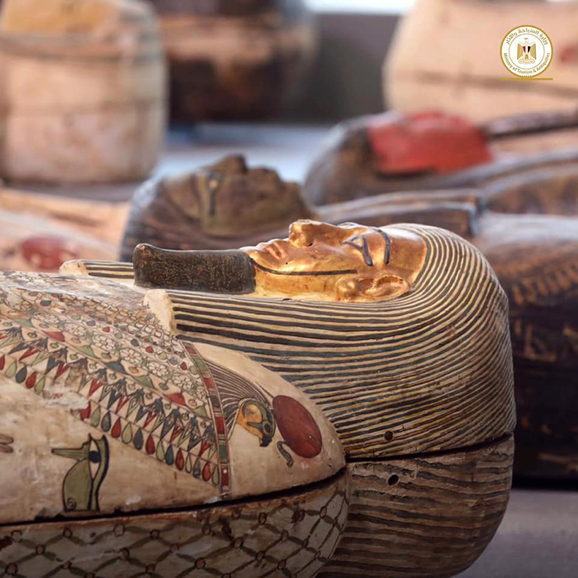 egypt unveils 100 newly-discovered sarcophogi - some with mummies inside