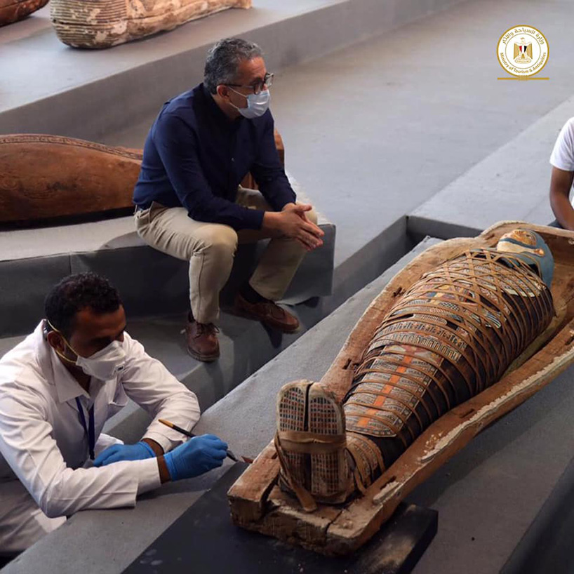 egypt unveils 100 newly-discovered sarcophogi - some with mummies inside