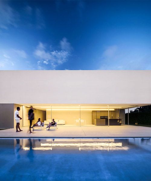 fran silvestre arquitectos designs 'house of silence' with hidden, elevated patios