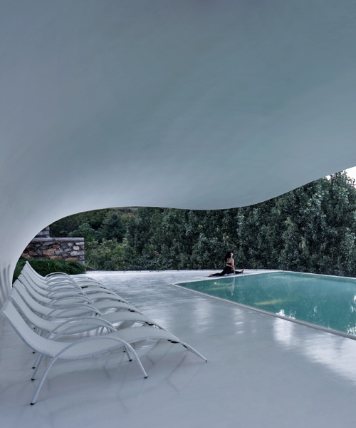 line+ studio's wellness retreat has a pool overlooking china's rural landscape