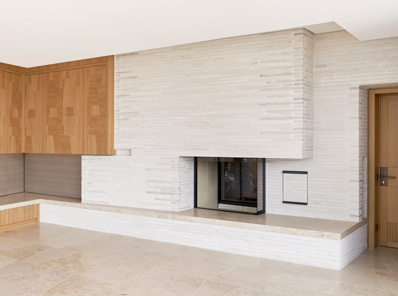 thatched hip roof tops hubschmitz architekten's house on föhr island, germany