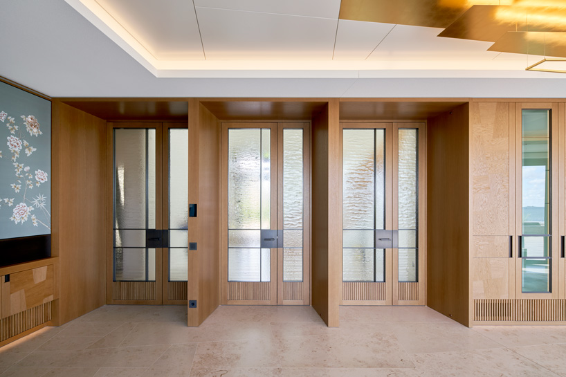 thatched hip roof tops hubschmitz architekten's house on föhr island, germany