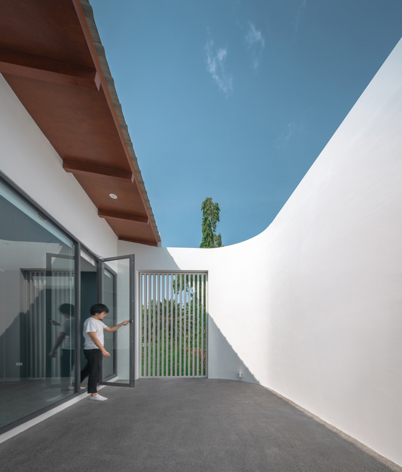 inly studio prioritizes privacy to design 'the hidden' house in chiang mai, thailand
