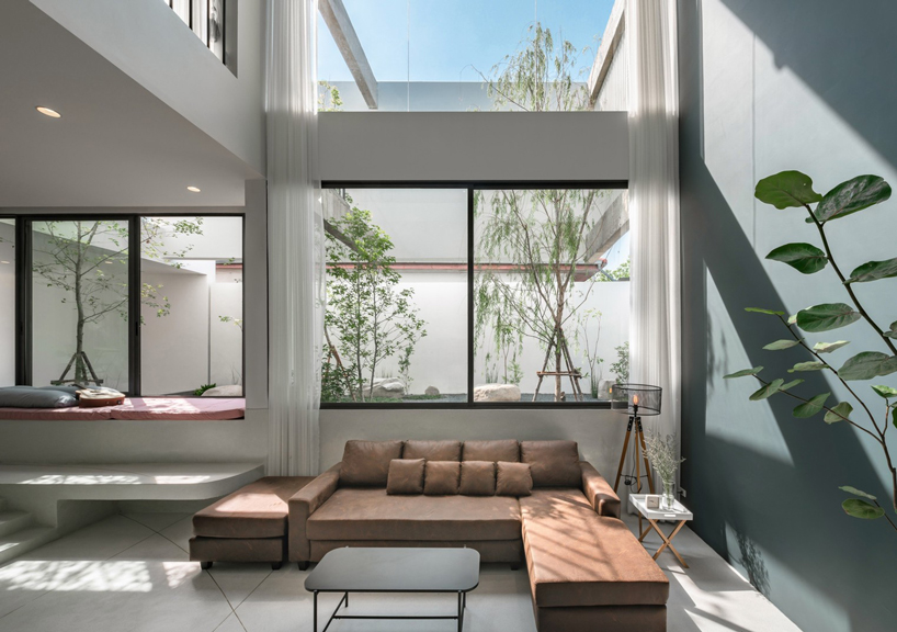 inly studio prioritizes privacy to design 'the hidden' house in chiang mai, thailand