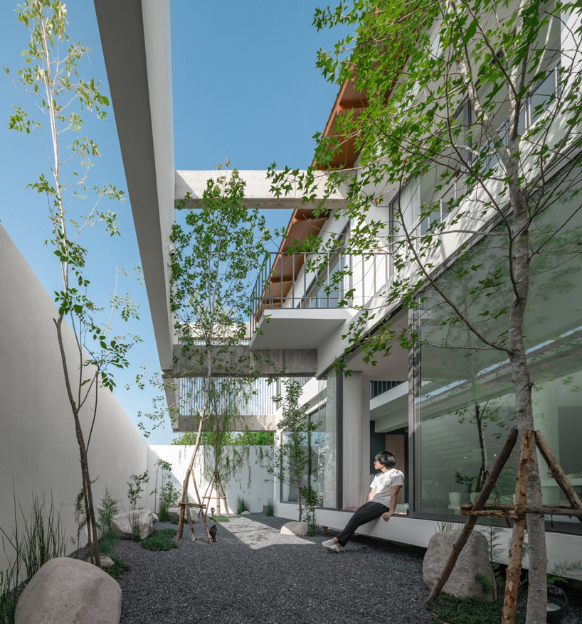 inly studio prioritizes privacy to design 'the hidden' house in chiang mai, thailand