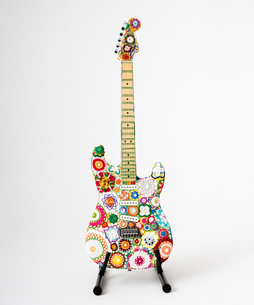 joana vasconcelos wraps a fender stratocaster guitar with technicolor floral crochet