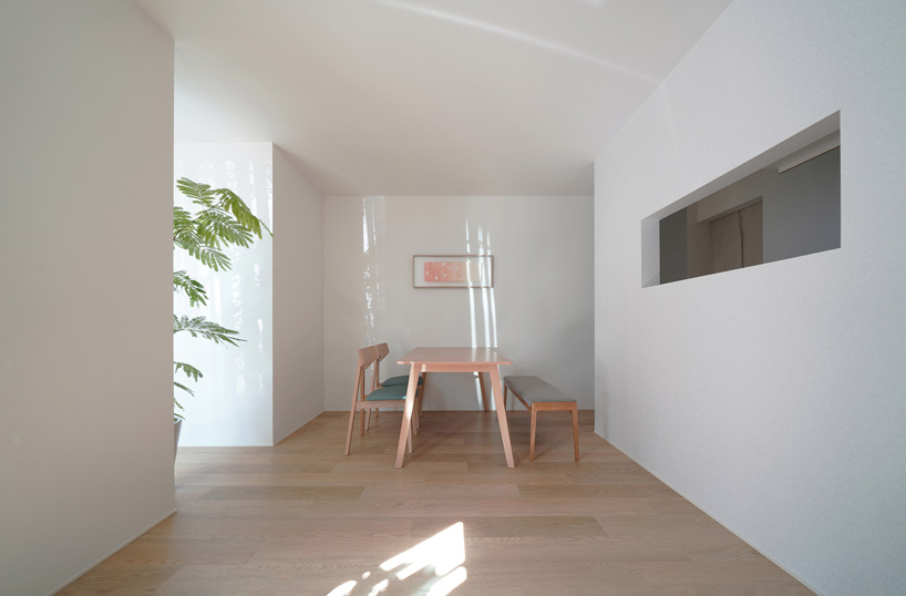 jun murata completes japanese guesthouse with small courtyard where light + shadow play