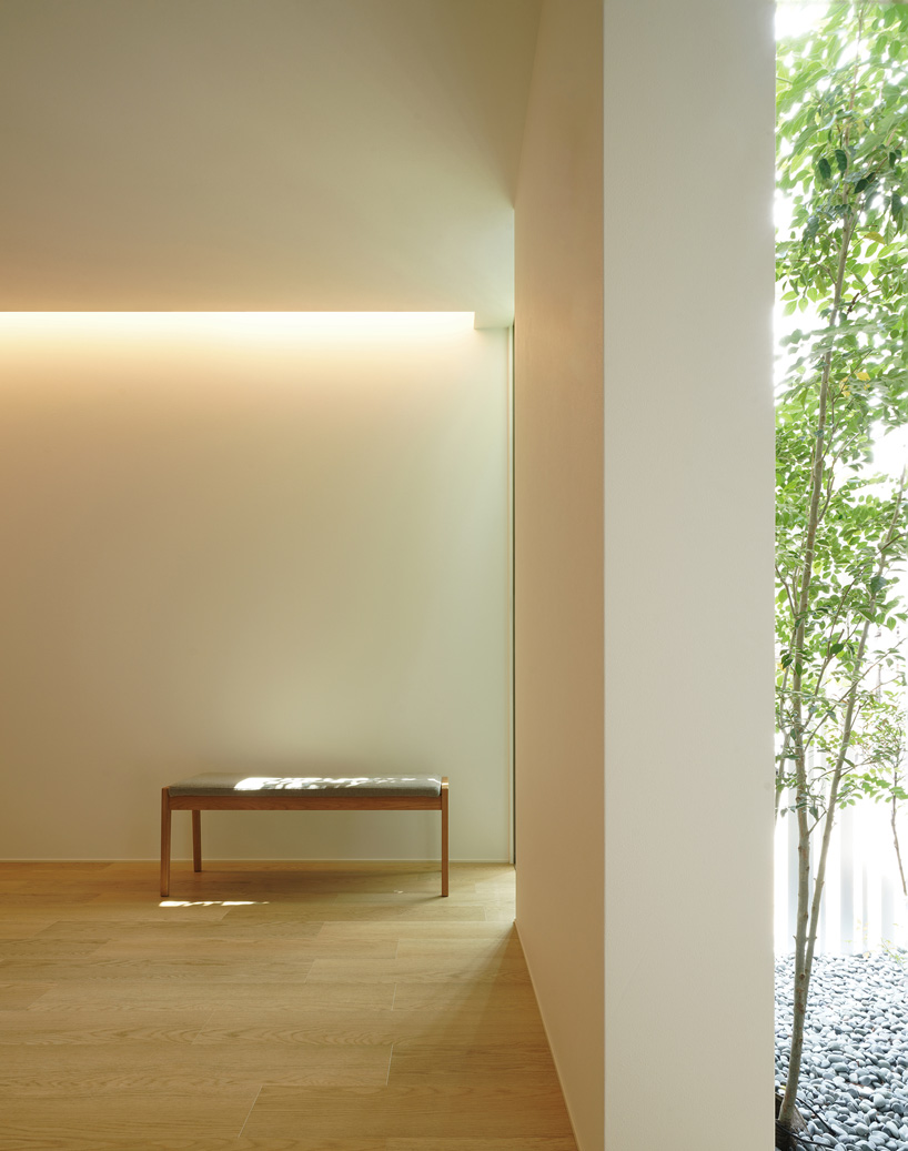 jun murata completes japanese guesthouse with small courtyard where light + shadow play
