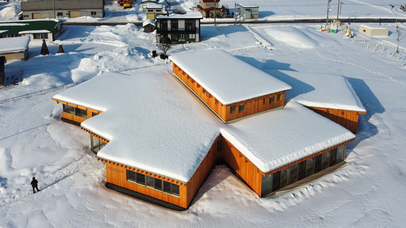 kengo kuma-designed nursery school in hokkaido honors the region's sunflowers