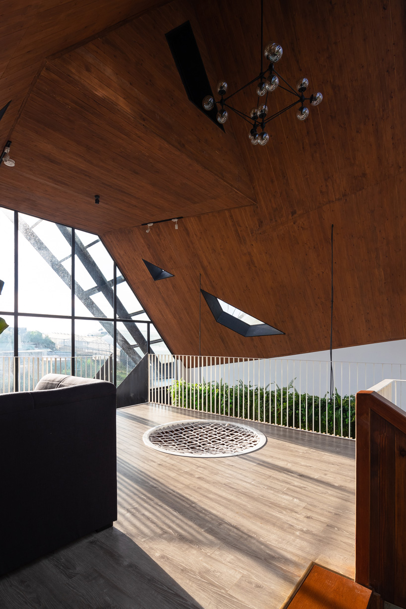 le house transforms vietnamese hotel into shining lantern with perforated steel façade