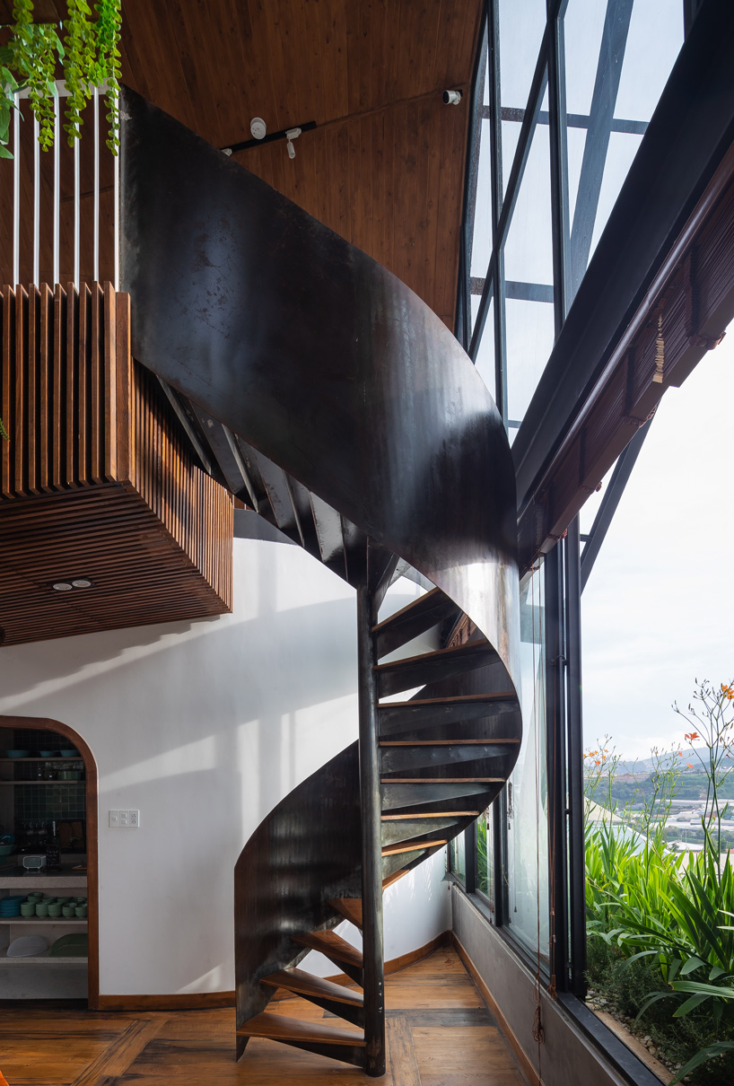 le house transforms vietnamese hotel into shining lantern with perforated steel façade