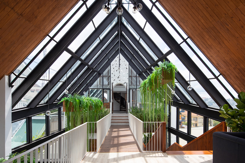 le house transforms vietnamese hotel into shining lantern with perforated steel façade