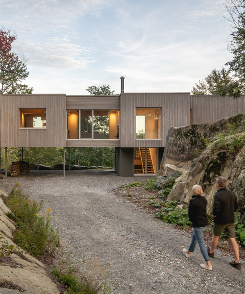 natalie dionne architecture embeds wooden house into rocky canadian forest