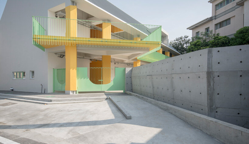 bright yellow columns complete ospacearchitects' tung yuan kindergarten ...