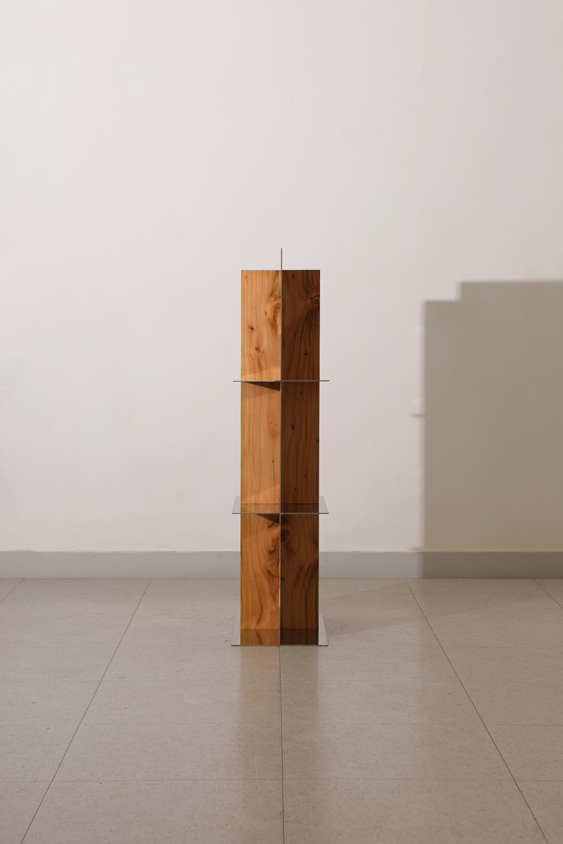 shinkyu shon fuses timber with metal and glass for 'split' furniture collection designboom