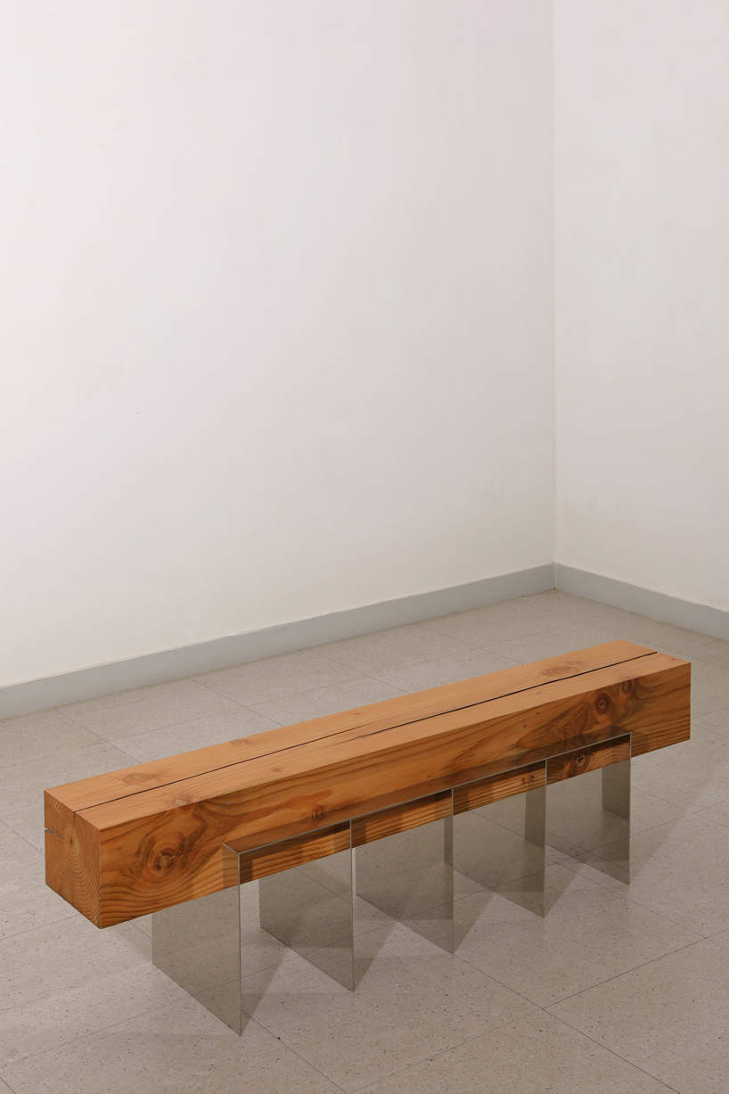 shinkyu shon fuses timber with metal and glass for 'split' furniture collection designboom