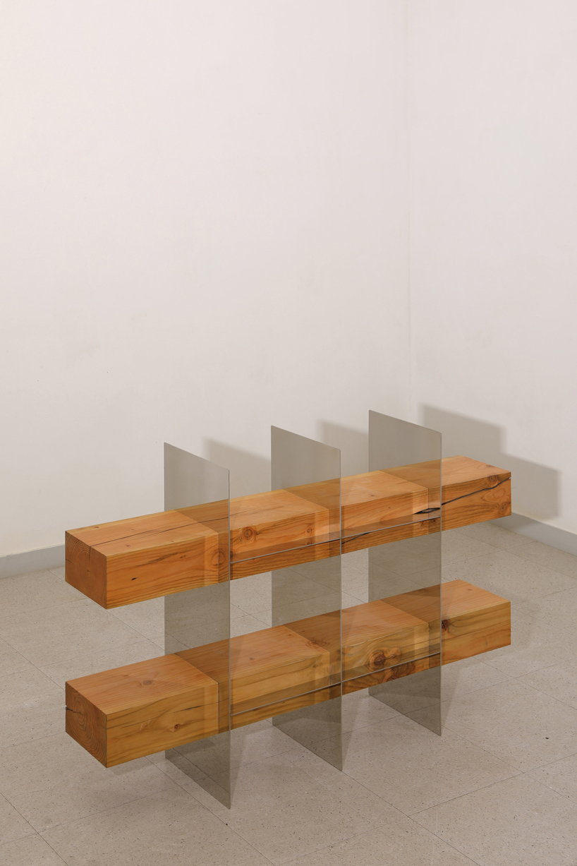 shinkyu shon fuses timber with metal and glass for 'split' furniture collection designboom
