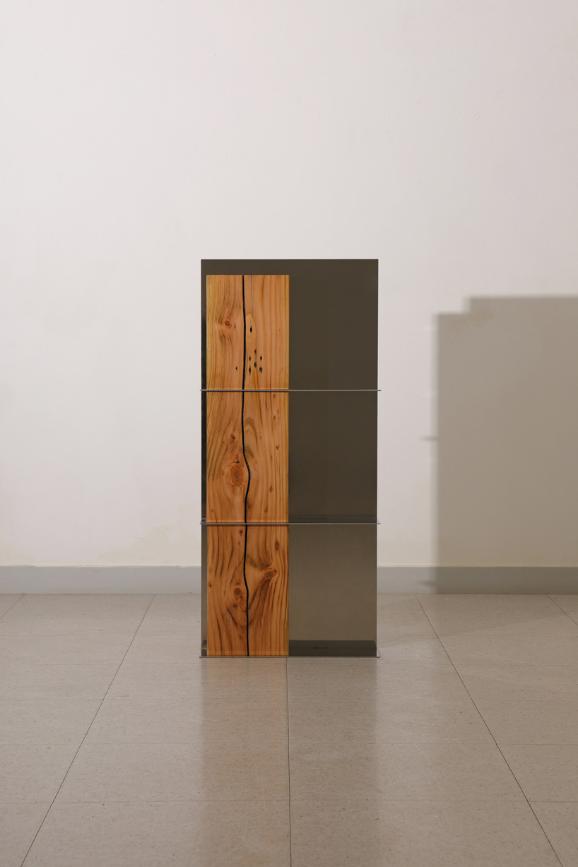 shinkyu shon fuses timber with metal and glass for 'split' furniture collection designboom