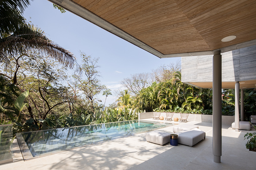 'atrium house' by studio saxe offers jungle and ocean views from a costa rica hilltop