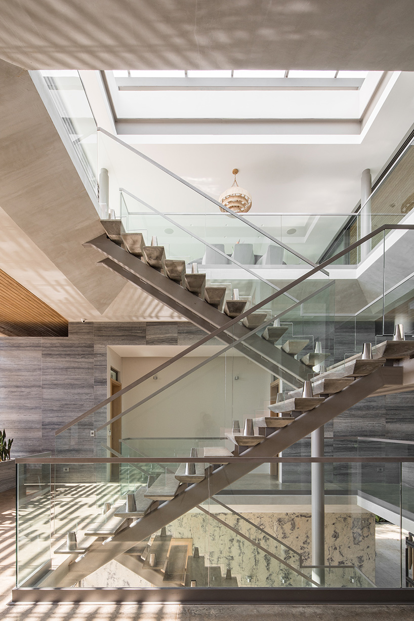 'atrium house' by studio saxe offers jungle and ocean views from a costa rica hilltop