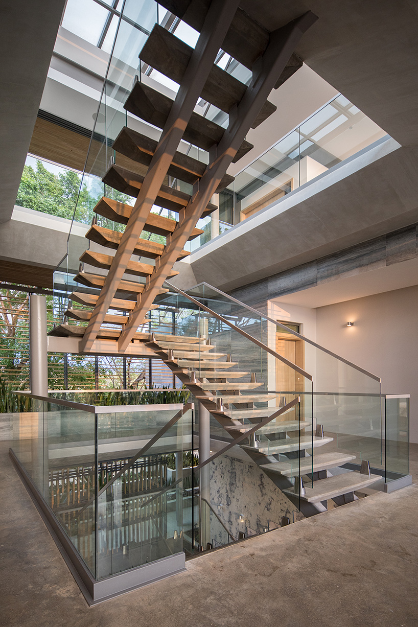 'atrium house' by studio saxe offers jungle and ocean views from a costa rica hilltop