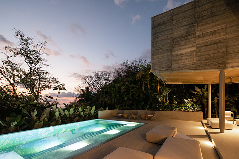 'atrium house' by studio saxe offers jungle and ocean views from a costa rica hilltop