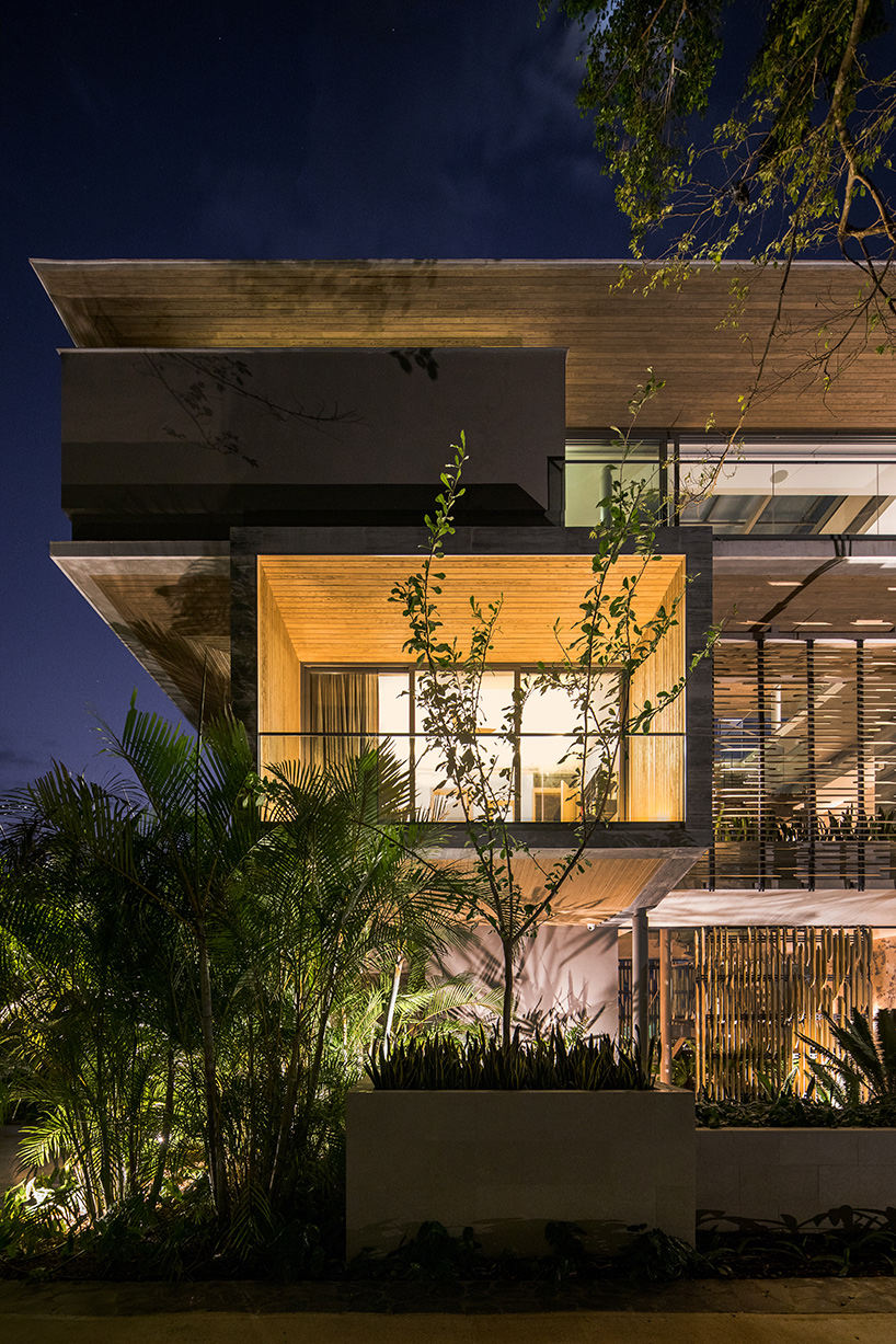 'atrium house' by studio saxe offers jungle and ocean views from a costa rica hilltop