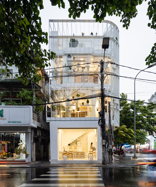 NKAA stacks a café and 3-generation family home onto a corner site in hue, vietnam