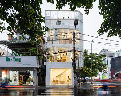 NKAA stacks a café and 3-generation family home onto a corner site in hue, vietnam