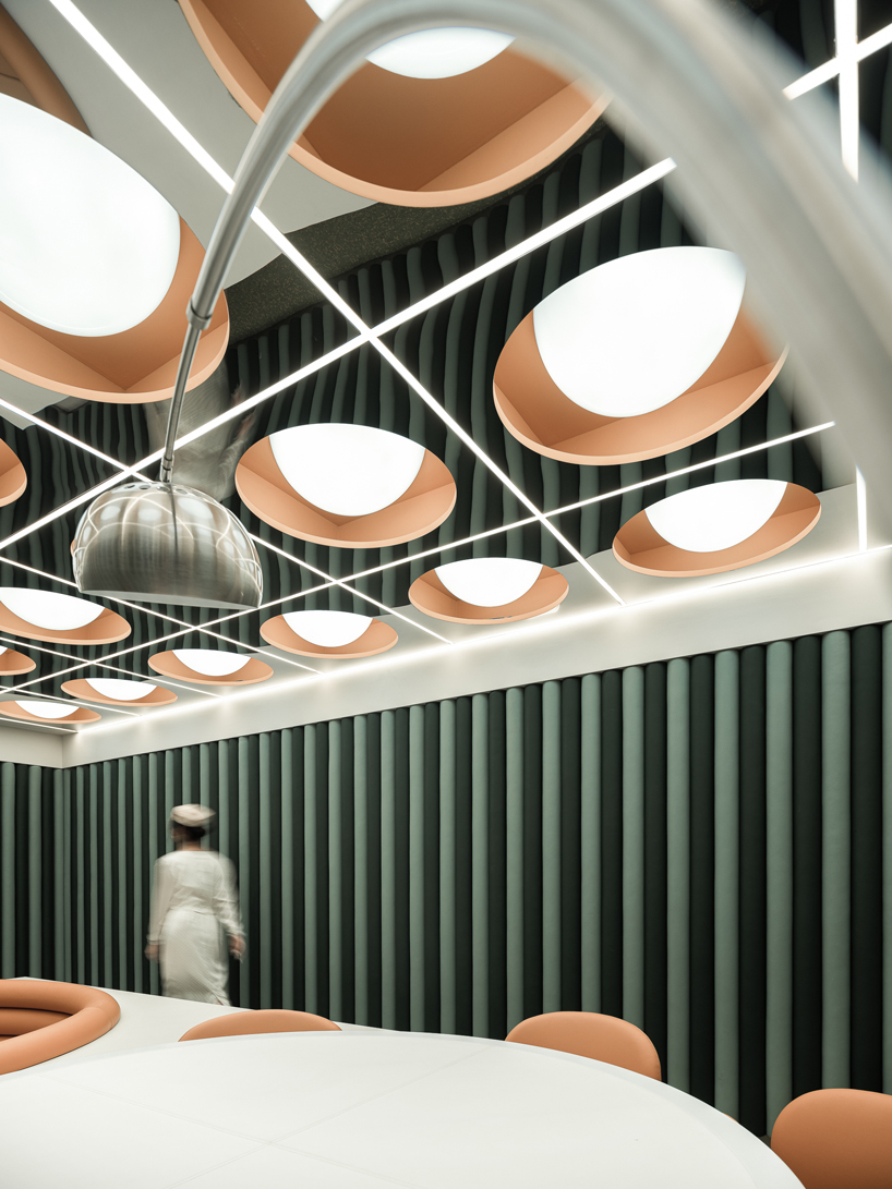 various associates creates a 'retro-futuristic' space for shanghai restaurant designboom