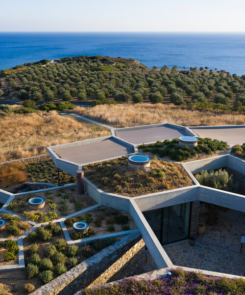 DECA architecture translates voronoi diagram into sunken 'hourglass corral' house in greece