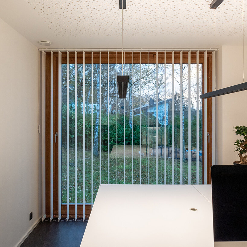 MIA architecture constructs mirror-clad volume to house its office near liège