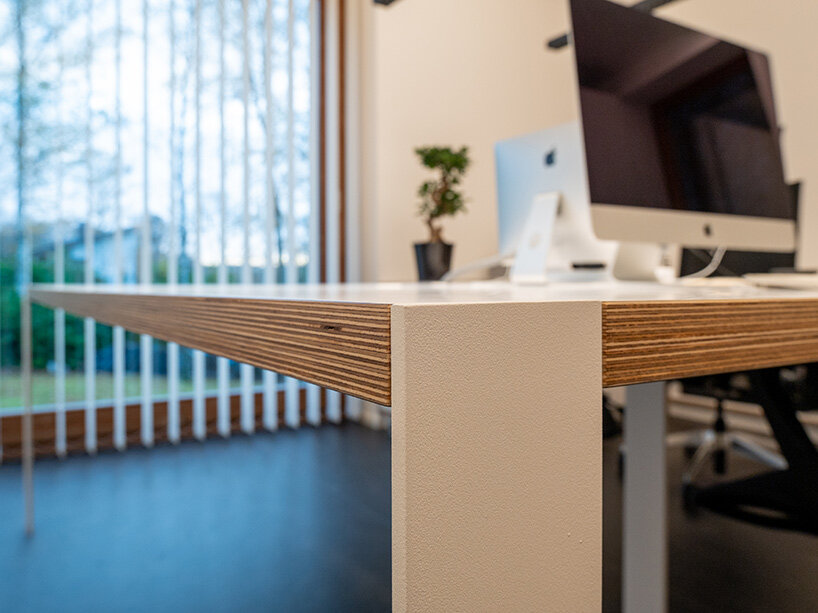 MIA architecture constructs mirror-clad volume to house its office near liège