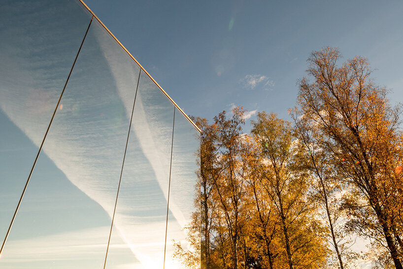MIA architecture constructs mirror-clad volume to house its office near liège