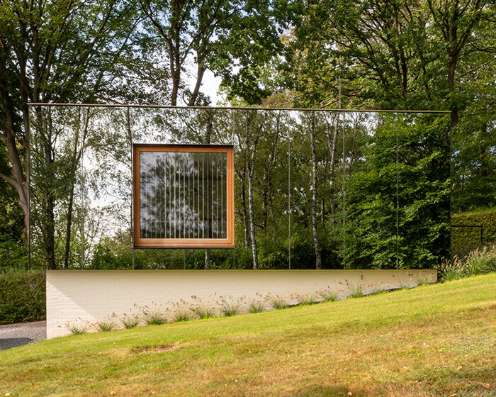 MIA architecture constructs mirror-clad volume to house its office near liège