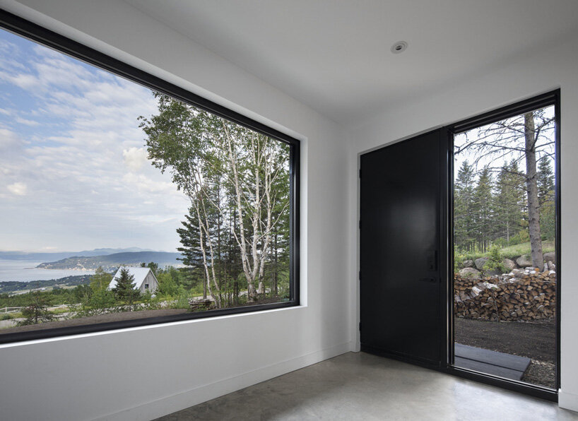 architecture49 stacks two off-center volumes into 'le littoral' holiday residence in canada