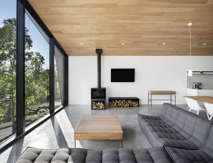 architecture49 stacks two off-center volumes into 'le littoral' holiday residence in canada