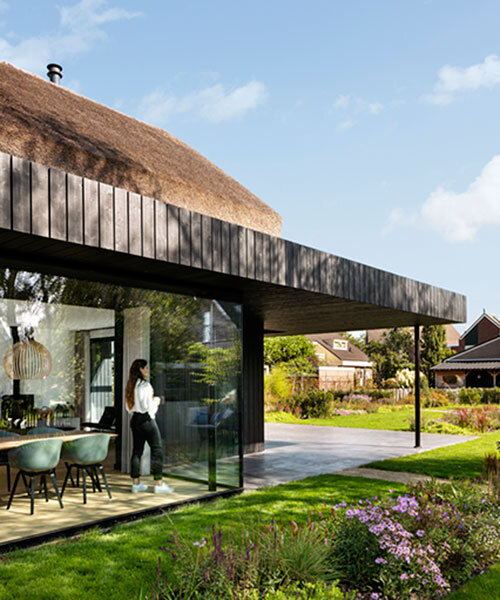 arjen reas architecten uses thatch & wood to build rural villa in the netherlands