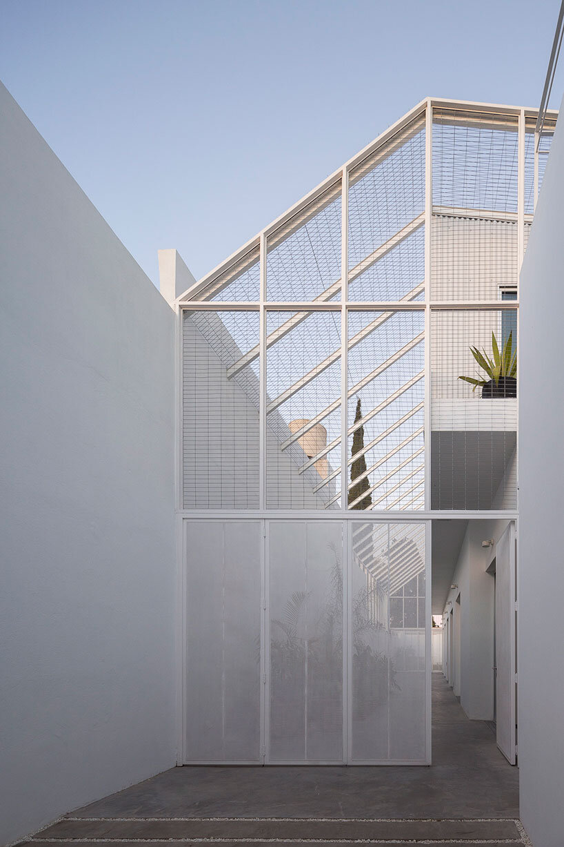 lightweight rib envelope clads patio in buenos aires residence by BHY arquitectos