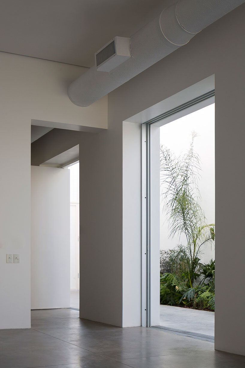 lightweight rib envelope clads patio in buenos aires residence by BHY arquitectos
