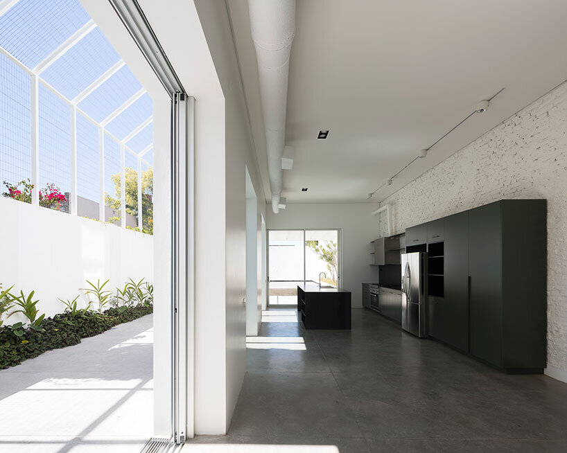 lightweight rib envelope clads patio in buenos aires residence by BHY arquitectos