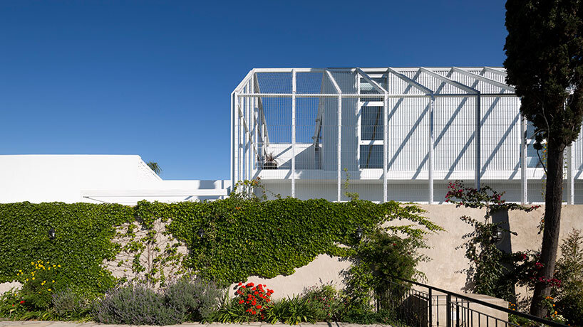lightweight rib envelope clads patio in buenos aires residence by BHY