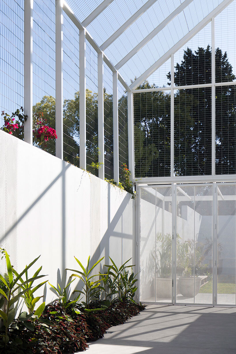 lightweight rib envelope clads patio in buenos aires residence by BHY