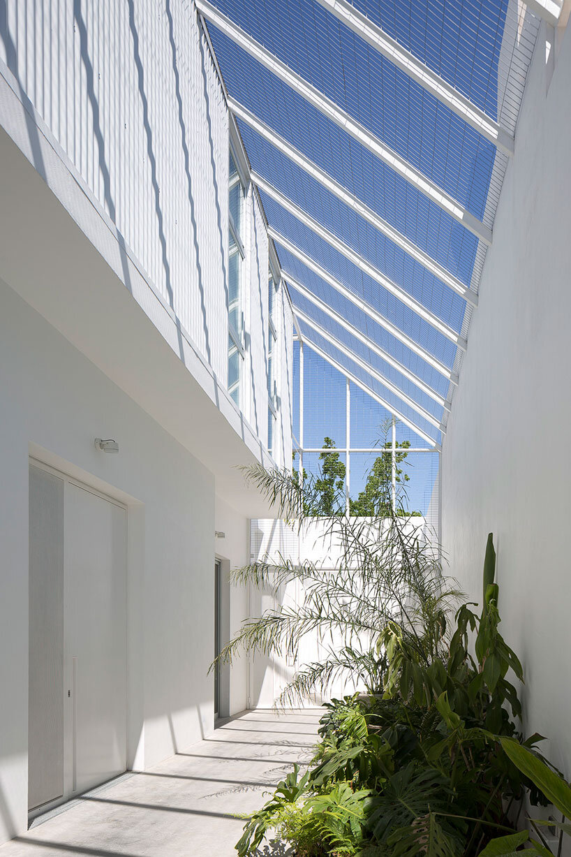 lightweight rib envelope clads patio in buenos aires residence by BHY