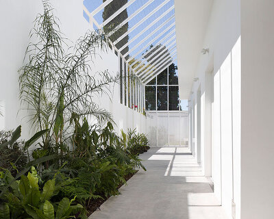 lightweight rib envelope clads patio in buenos aires residence by BHY arquitectos