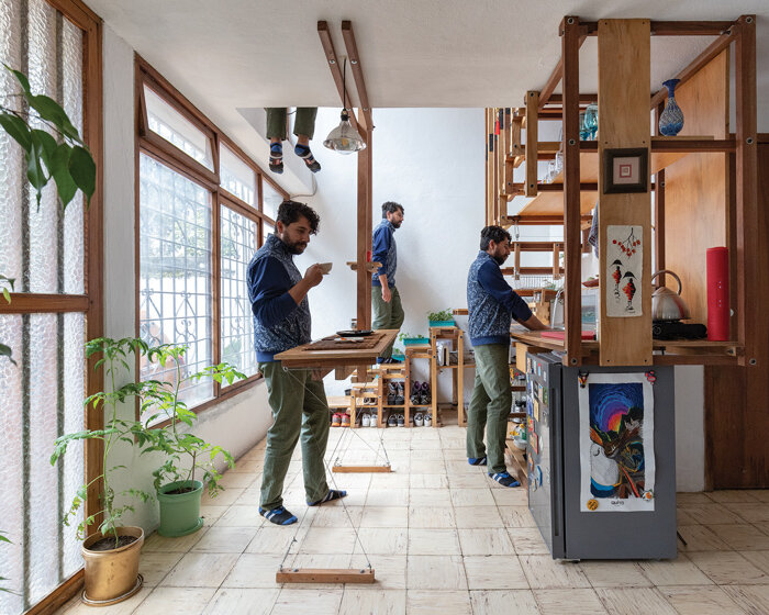 the 'cave of the tiny beast' addresses a growing lack of dwelling space in quito, ecuador